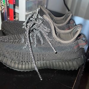 Black YEEZYS with shoelace reflectives authentic